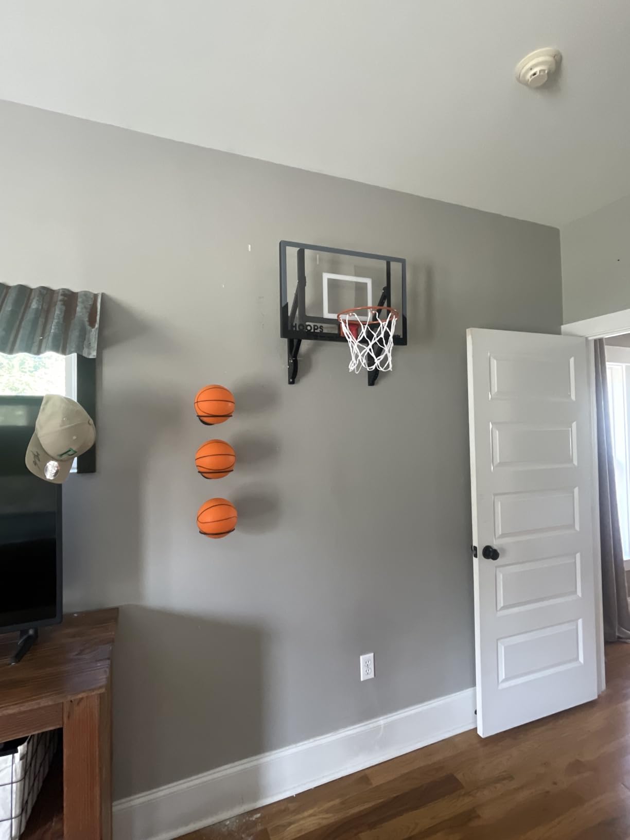 Franklin Sports Pro Hoops Adjustable Wall-Mounted Basketball Hoop - XL | Shatter-Resistant Backboard, Fold-Away Rim Saves Space, Steel Hardware + Anchors Included, Great For Man Caves + Game Rooms customer photo 1