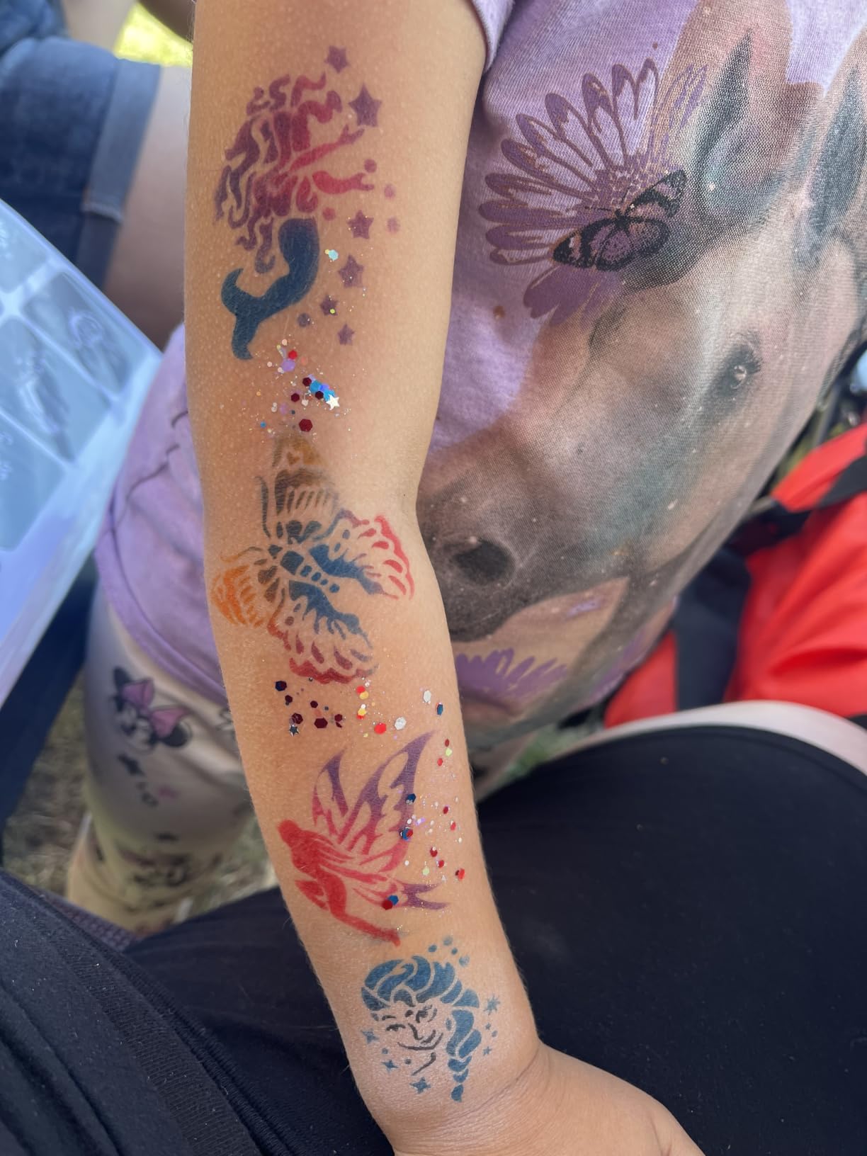 100pieces Reuseable Airbrush Temporary Tattoo Stencils Book Airbrush Tattos for Face, Body, Paint Art, Hobby. customer photo 1