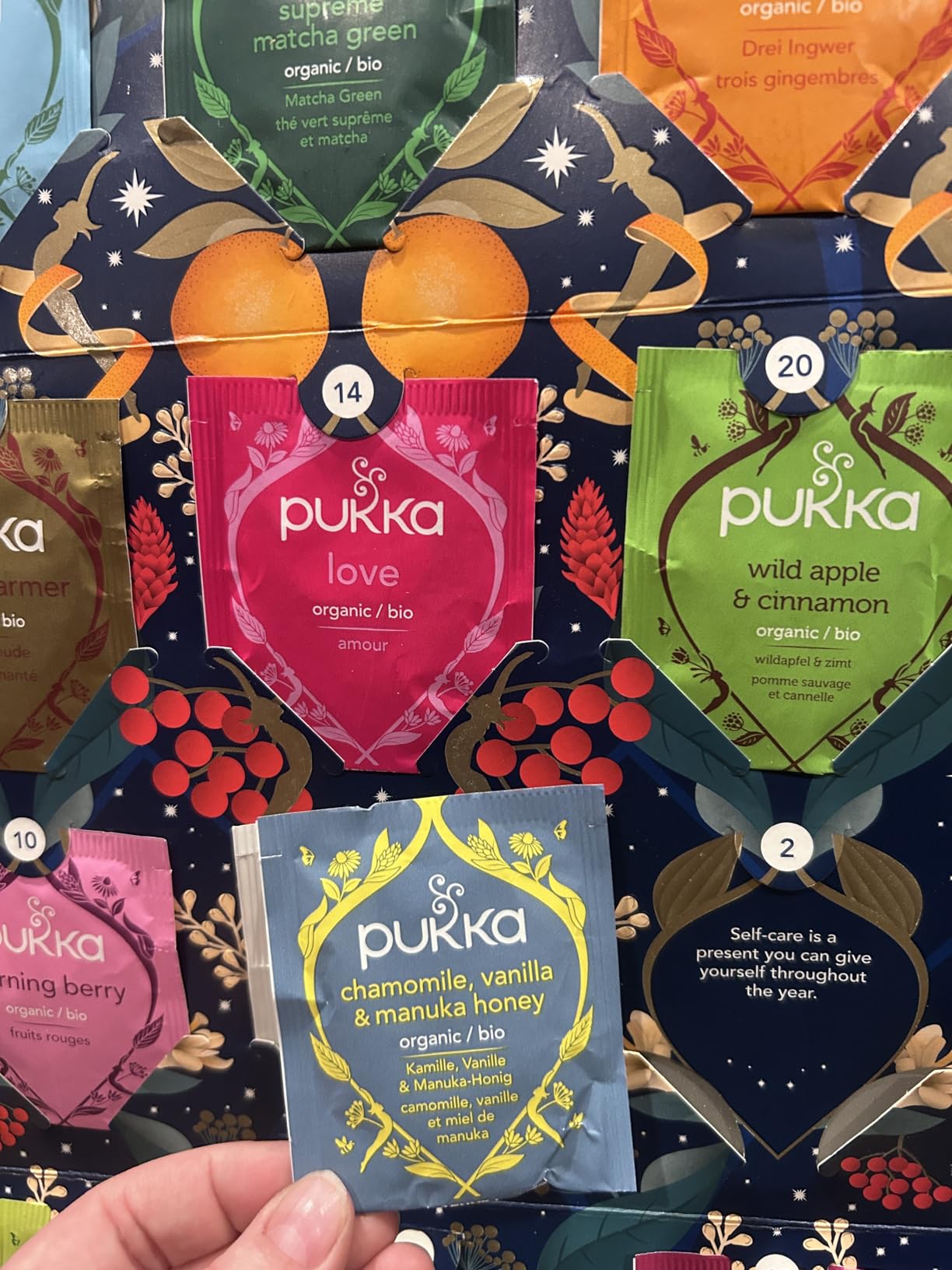 Pukka Christmas Tea Sampler, Selection of 24 Delightful Black & Green Tea Infusions, Advent Calendar Holiday Gift Set for Tea Lovers, 100% Organic customer photo 1