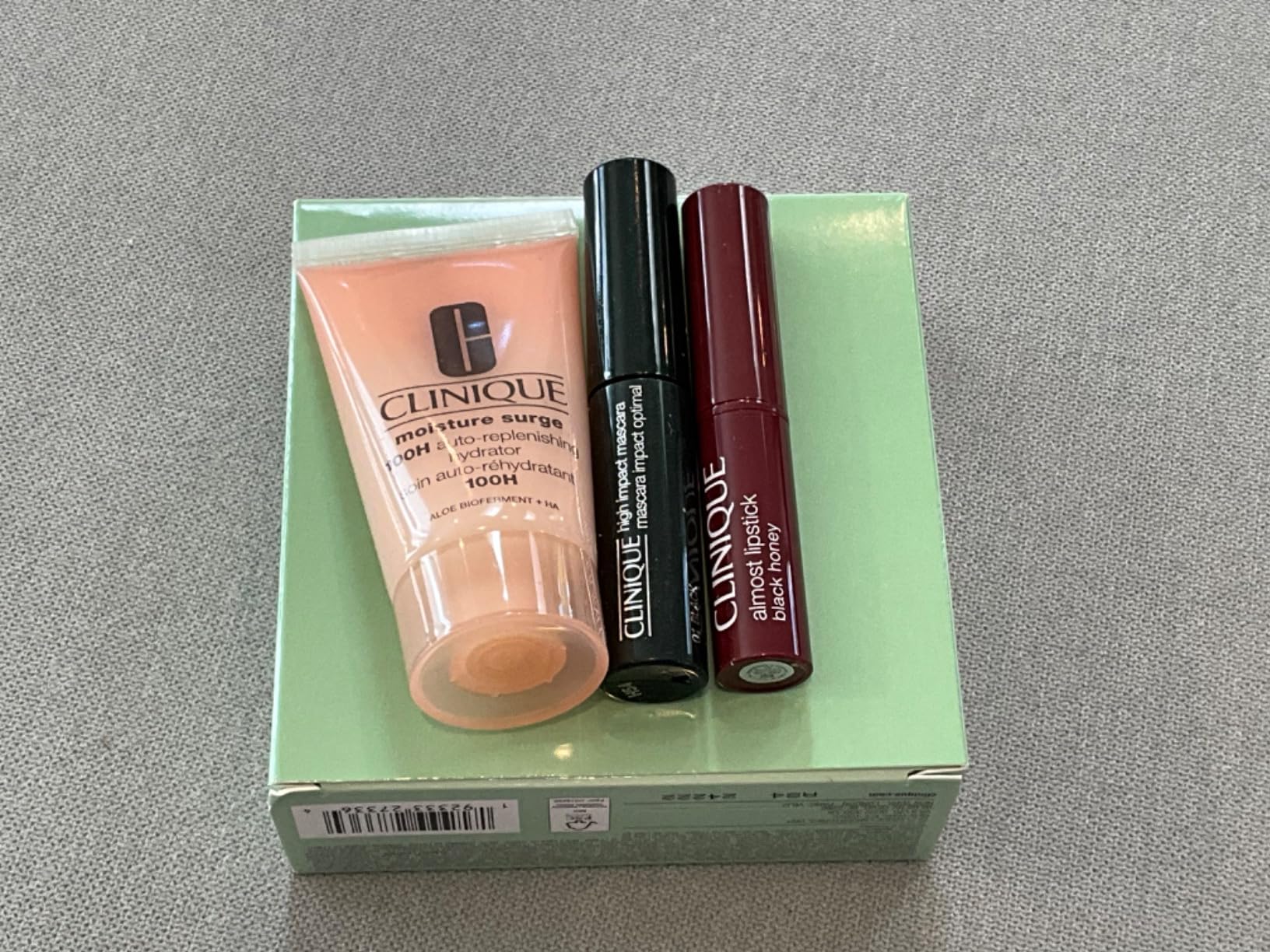 Clinique Icons Gift Set | Almost Lipstick in Black Honey | Moisture Surge 100H Moisturizer, 1 Fl Oz | High Impact Mascara | Hydrating + Glow | Includes 3 Travel Size Pieces customer photo 2