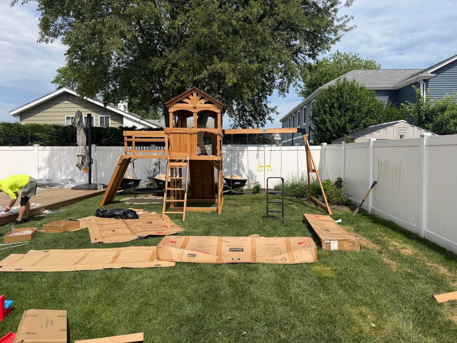 Backyard Discovery Dover Bay Spruce Wood Swing Set with Wave Slide, Clubhouse, Monkey Bars, Rock Wall, Belt Swings, Step Ladder, Toy Telescope, Chalkboard, Outdoor Playset customer photo 1