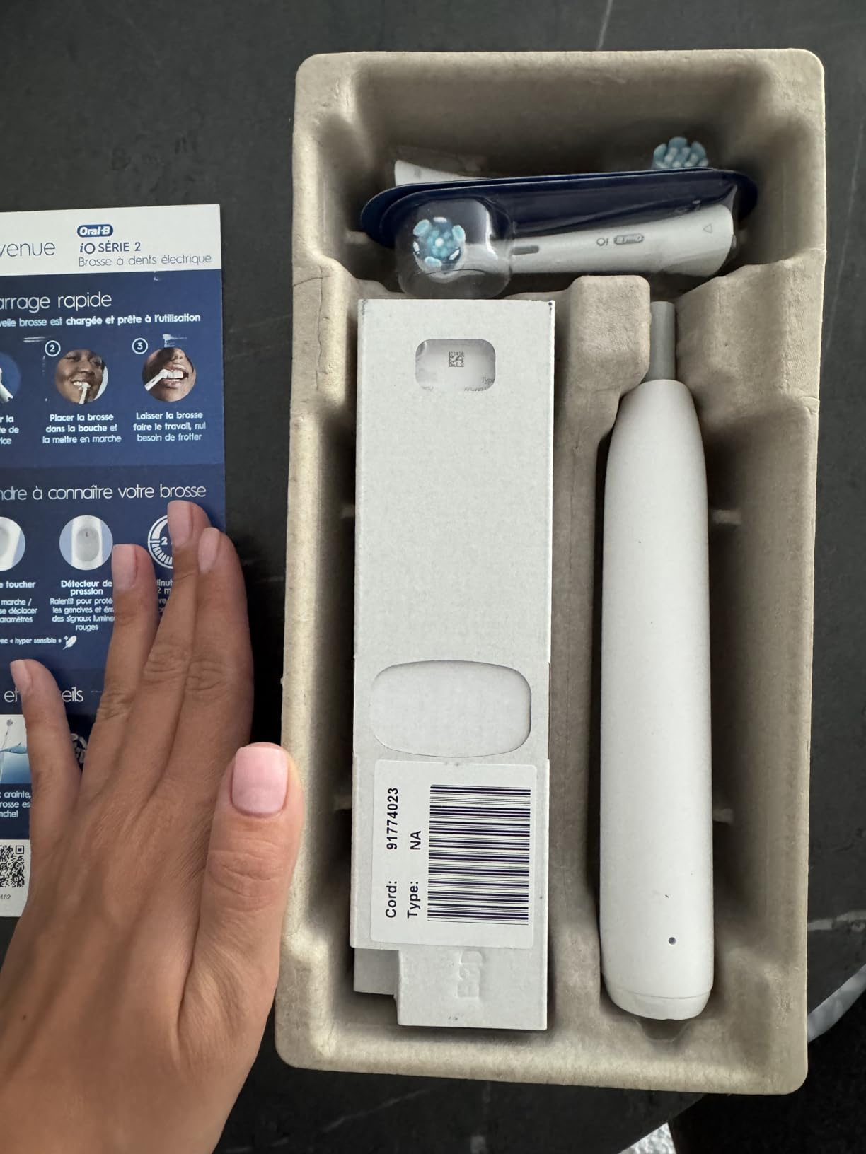 Oral-B Rechargeable Electric Toothbrush, iO2 Starter Kit, 3 Cleaning Modes, Automatic Pressure Sensor to Protect Gums, 2 Brush Heads, Pure White customer photo 2